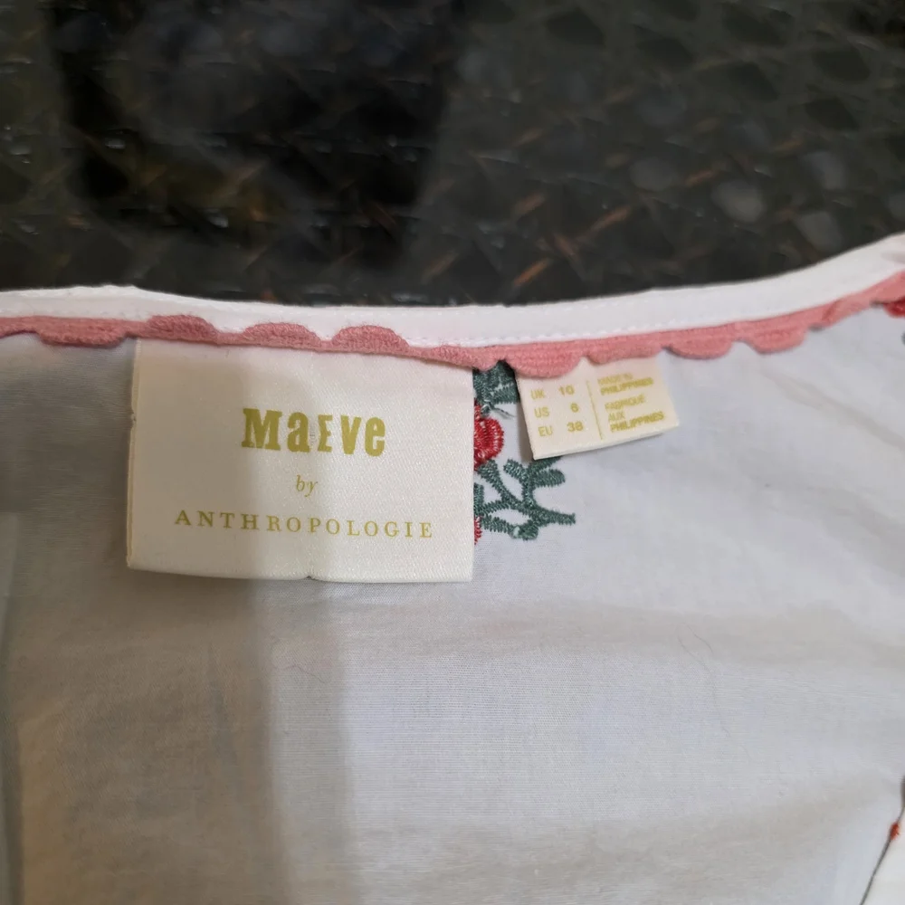 Anthropologie Maeve Embroidered White Floral Wrap Blouse with Red Rose